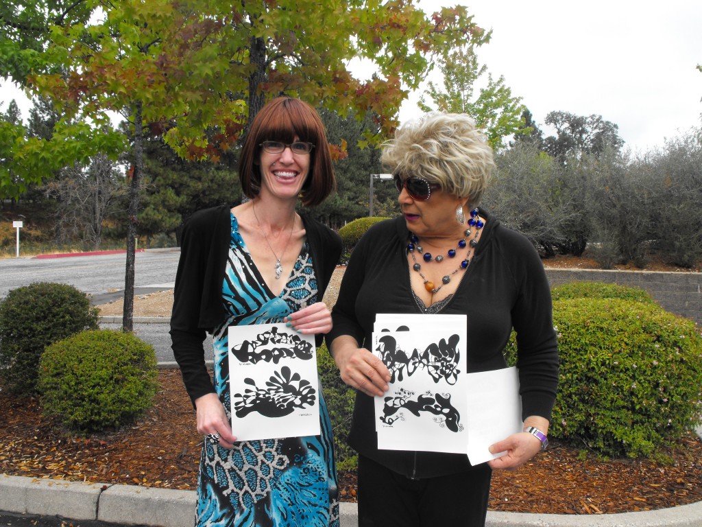 Amy and LeslieAnn displaying Waking State Trigger Tattoos at Amy's Place