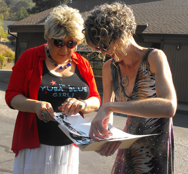 Amy & LeslieAnn hand-draw all their designs, such as these that they're deciding to print for the upcoming holiday markets.