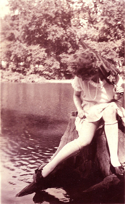 My Kodak Brownie photo of Aunt Bertha adjusting her stocking, Sand Dunes Vermont, 1949.